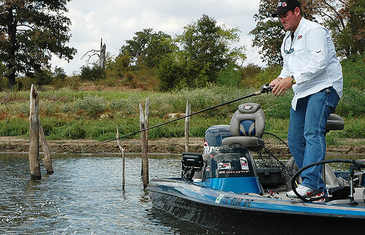 On some timber choked lakes like Lake Fork and Toledo Bend, stump fields can harbor big bass even on the hottest days of summer. (Lynn Burkhead photo)