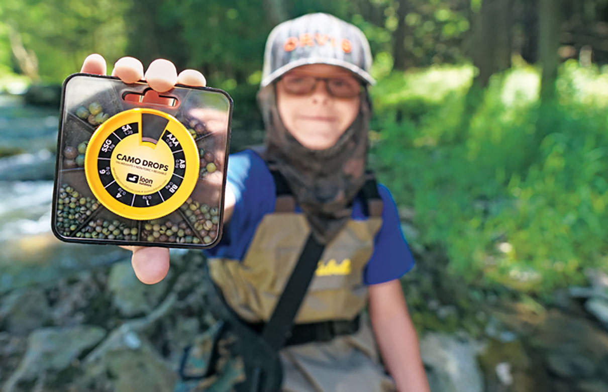 Our children will inherit our trout streams and whatever we leave in them. The new Camo Drops from Loon Outdoors are made from non-toxic tin and are available in nine sizes and two different container options. (George Daniel photo)