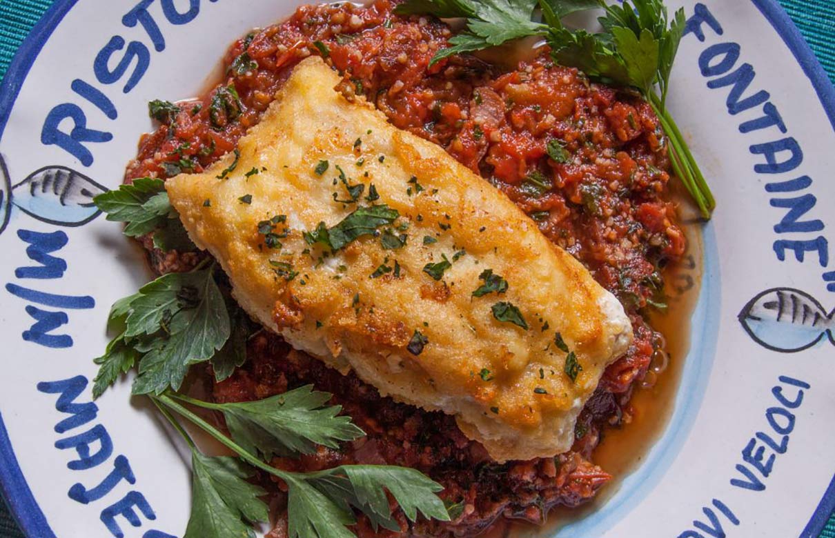 A vibrant and spicy tomato-based sauce complements firm-fleshed fish with rich flavors like grouper. (Photo courtesy of FloridaSportsman.com)